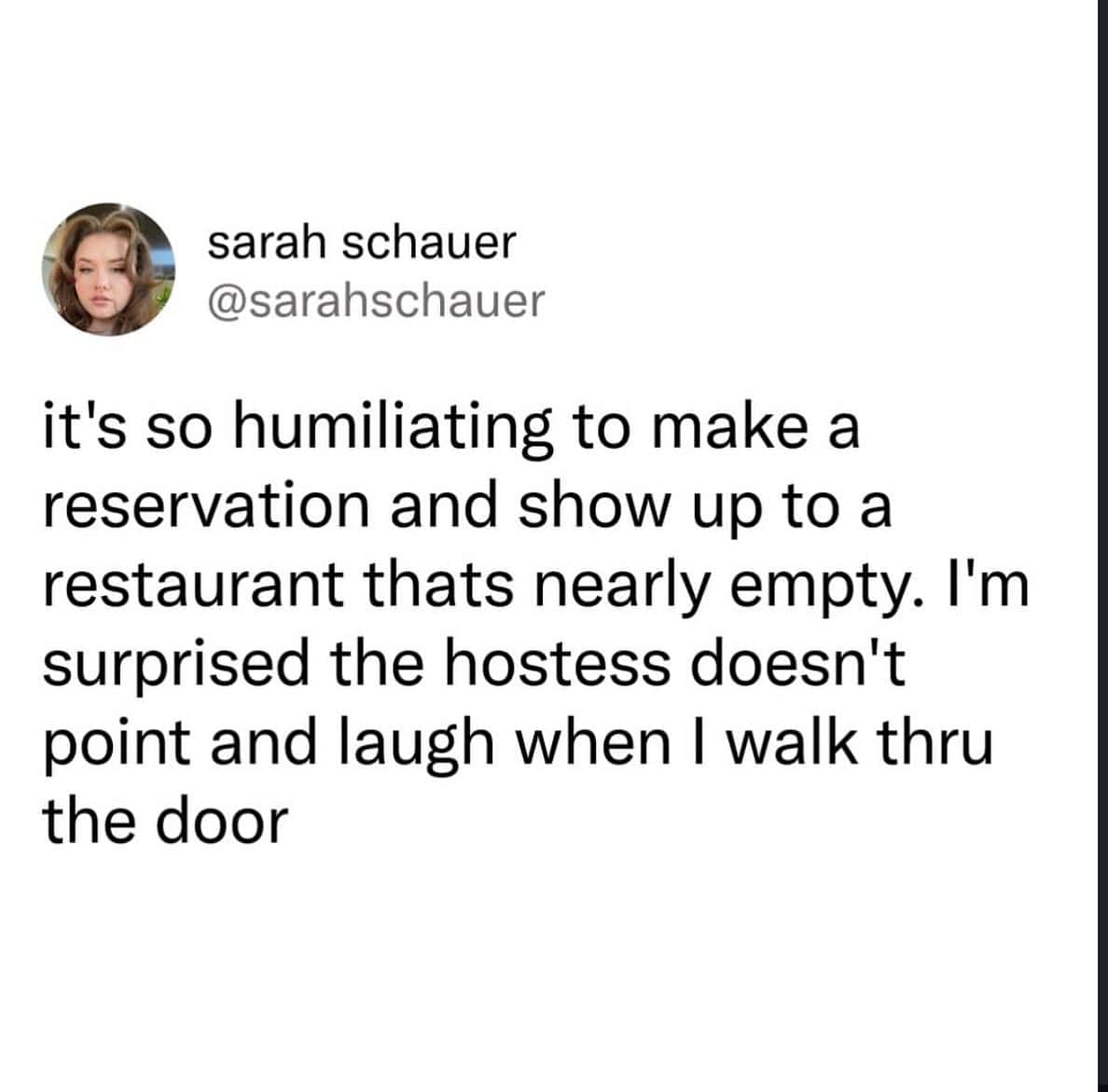 A funny food tweet about the shame of reserving a table at an empty restaurant.