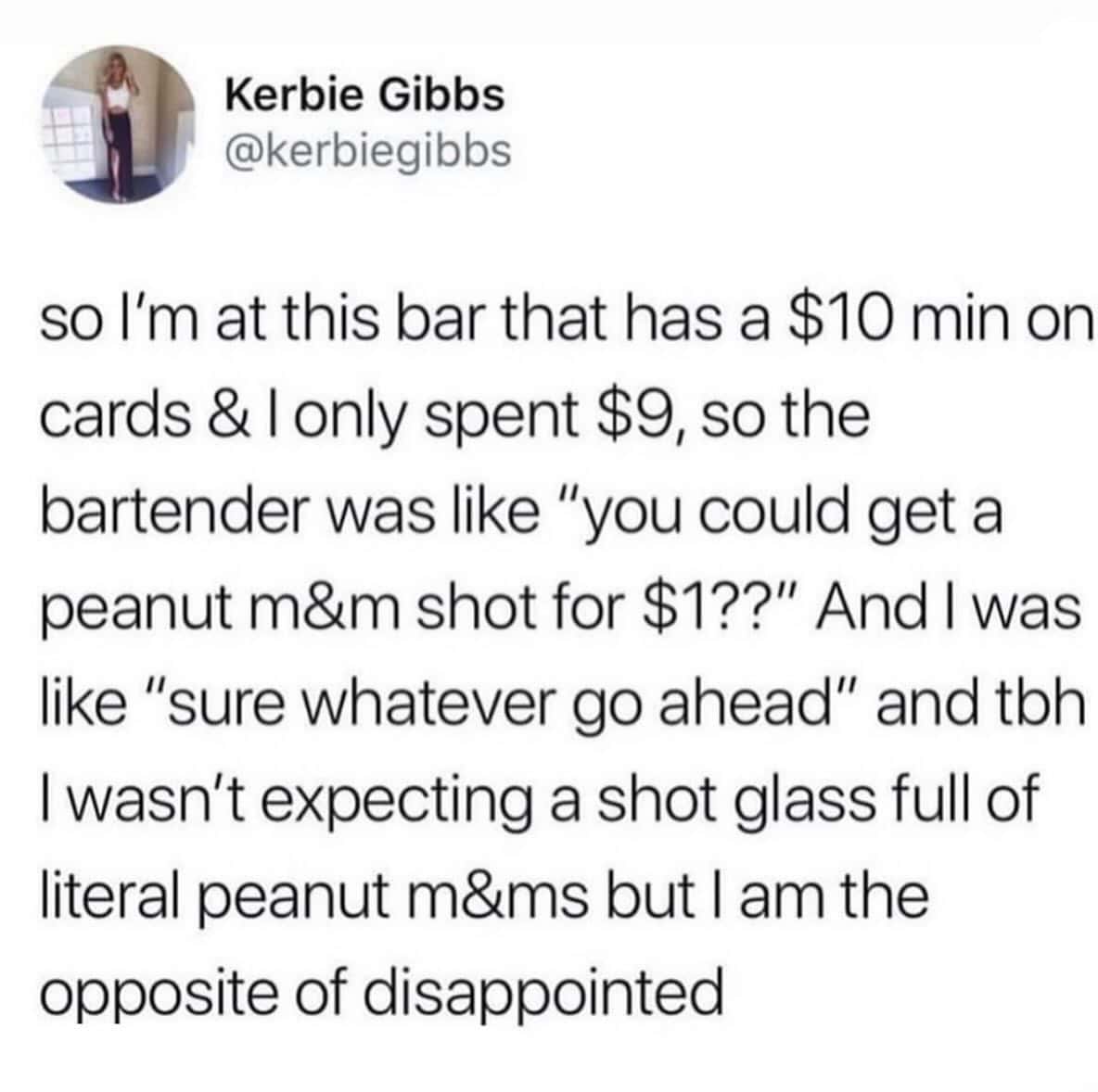 A funny food tweet showing a shot glass filled with peanut M&Ms.