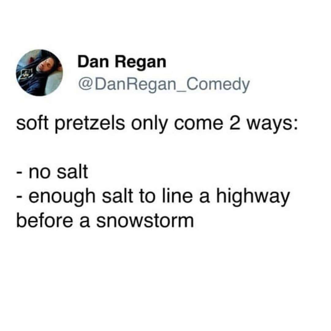 A funny food tweet exaggerating the amount of salt on soft pretzels.