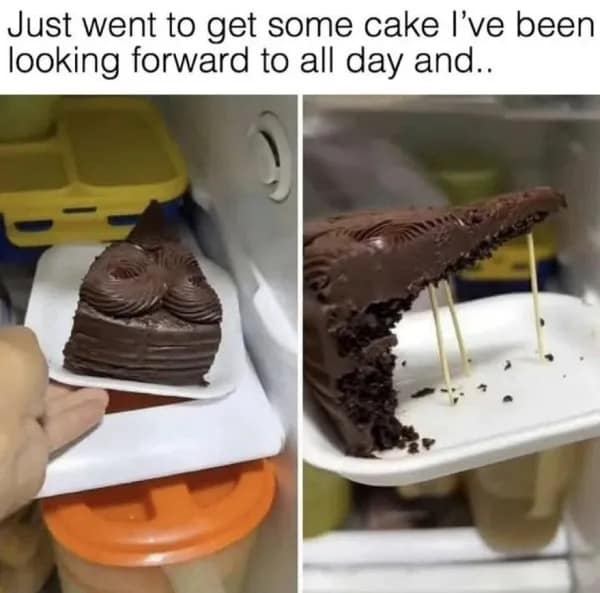 Chocolate cake slice filled with nothing but support sticks instead of cake.