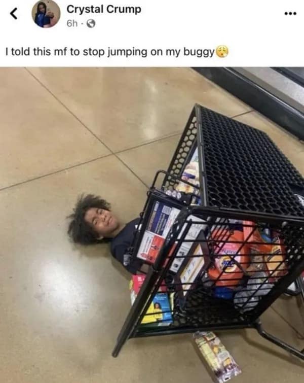 Child trapped under overturned shopping cart in grocery store aisle after jumping.