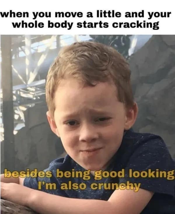 Grimacing kid meme caption about body joints cracking and being crunchy.