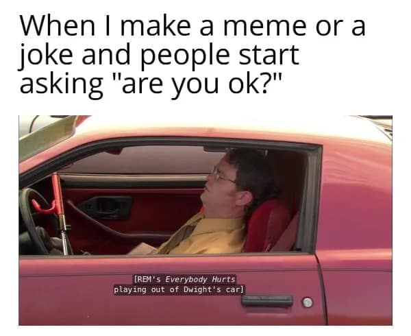 Dwight Schrute sitting in car listening to REM Everybody Hurts.