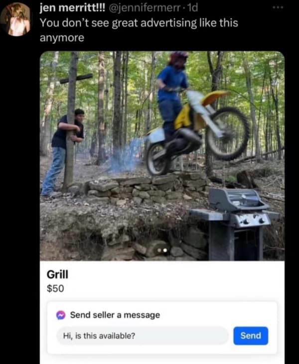 Man jumping dirt bike over a grill while friend hugs tree in background.