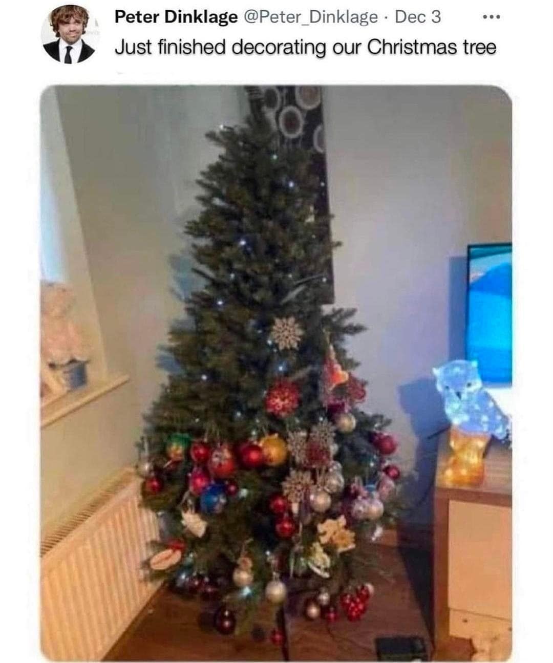 Christmas tree decorated only at the very bottom posted by actor Peter Dinklage.