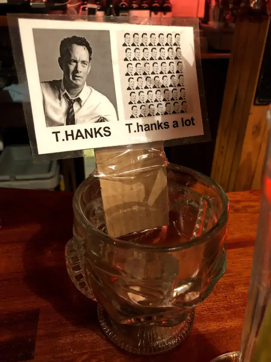 A creative tip jar using Tom Hanks faces to make a T.Hanks pun
