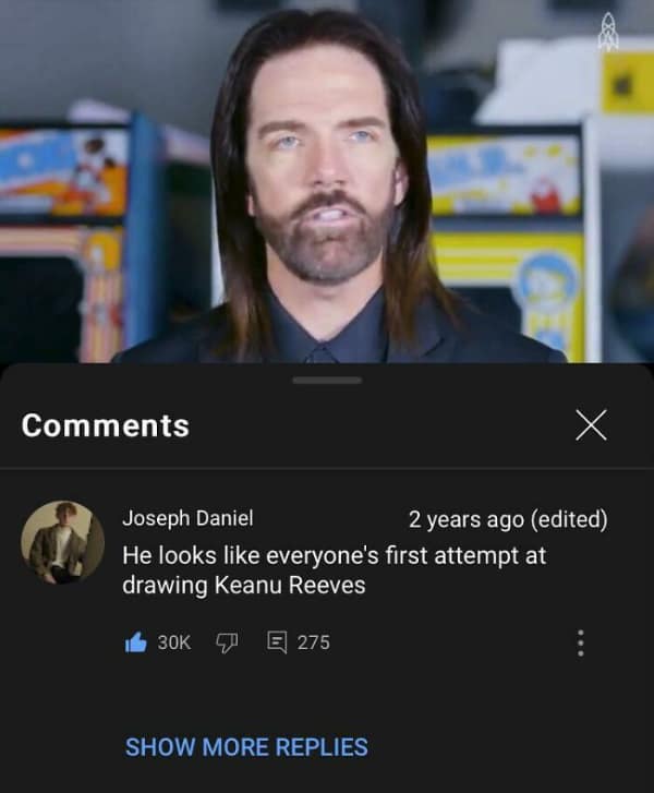 This funny youtube comment compares Billy Mitchell to a bad drawing of Keanu Reeves