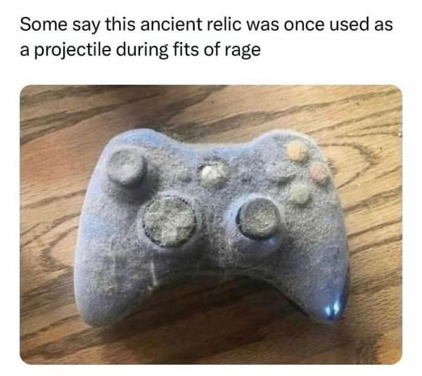 A classic gamer meme showing a dusty Xbox 360 controller that was used as a projectile.