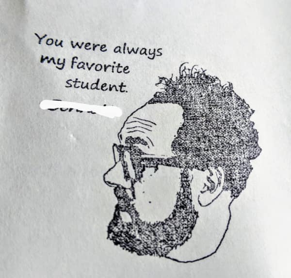 Rubber stamp imprint with teacher's face saying you were always my favorite student.