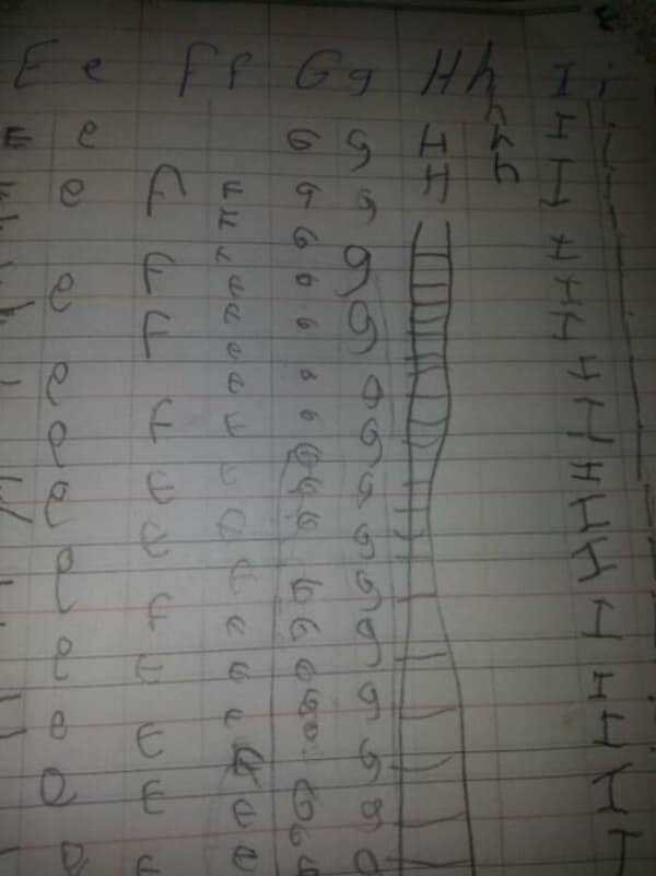 Child's handwriting homework where letter H devolves into long ladder drawing.