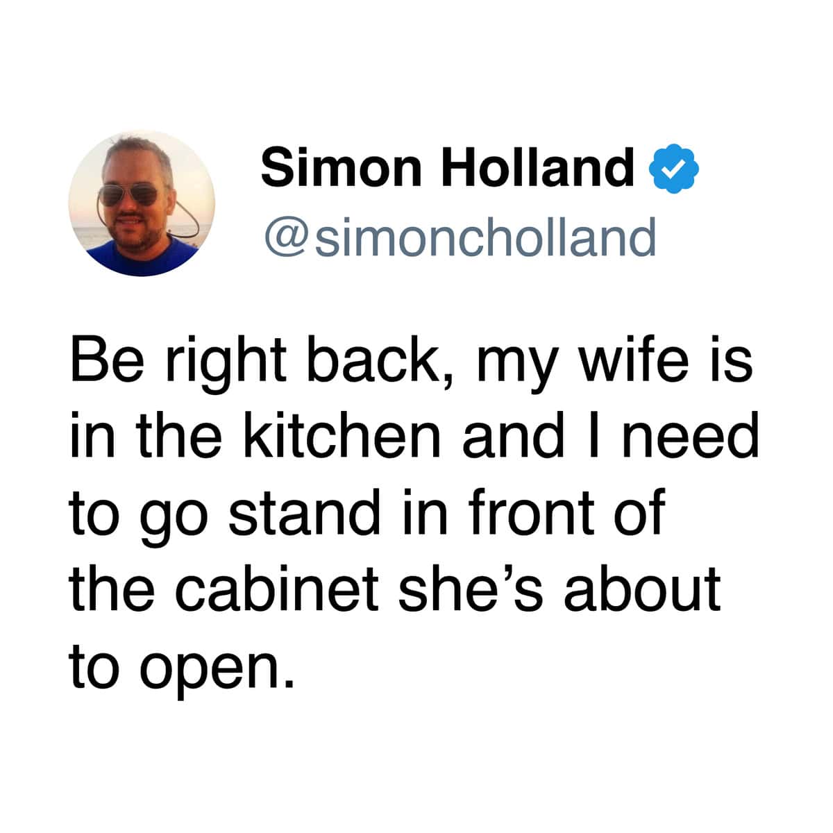 A marriage meme tweet about the husband standing exactly where the wife needs to be in the kitchen.