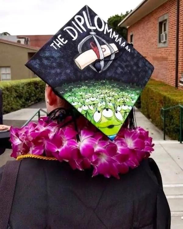 A hilarious meme of a graduation cap painted with Toy Story aliens saying The Diploma.