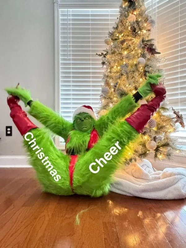 A funny meme showing the Grinch doing the splits with text labels for Christmas Cheer.