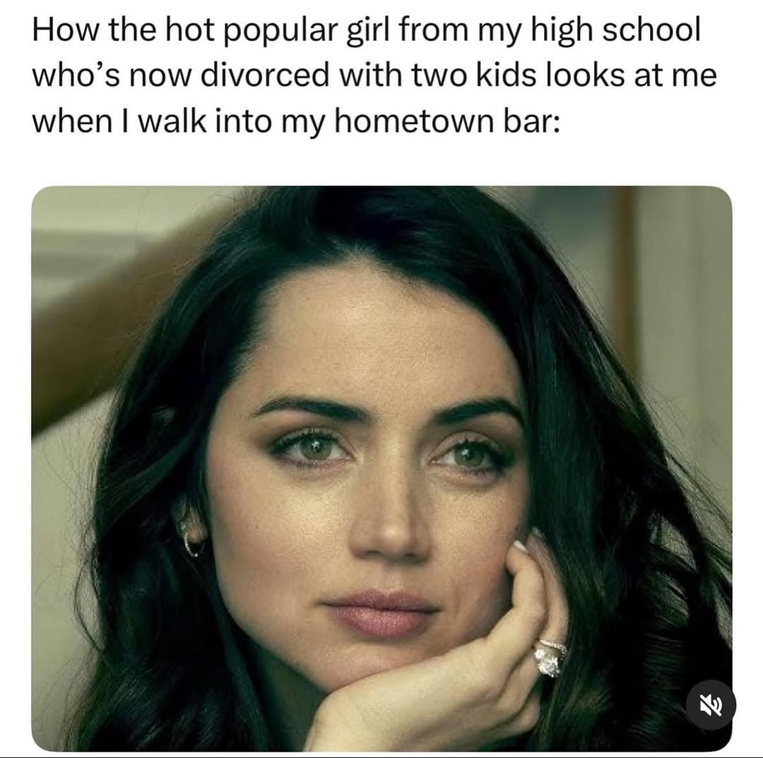 A funny meme of Ana de Armas staring intensely at the camera.