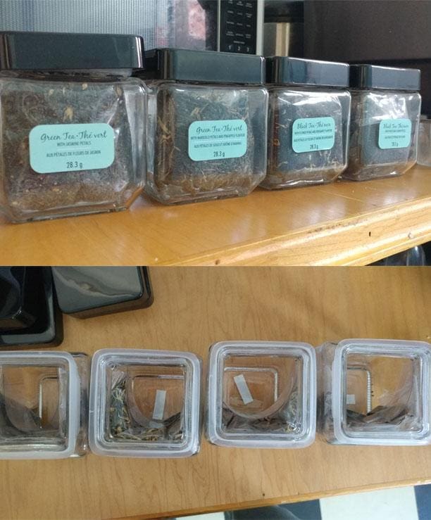 Glass jars of tea where the label covers the empty space leaving only a small amount of tea at the bottom