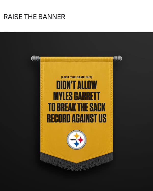Steelers banner celebrating not letting Myles Garrett break sack record despite loss.
