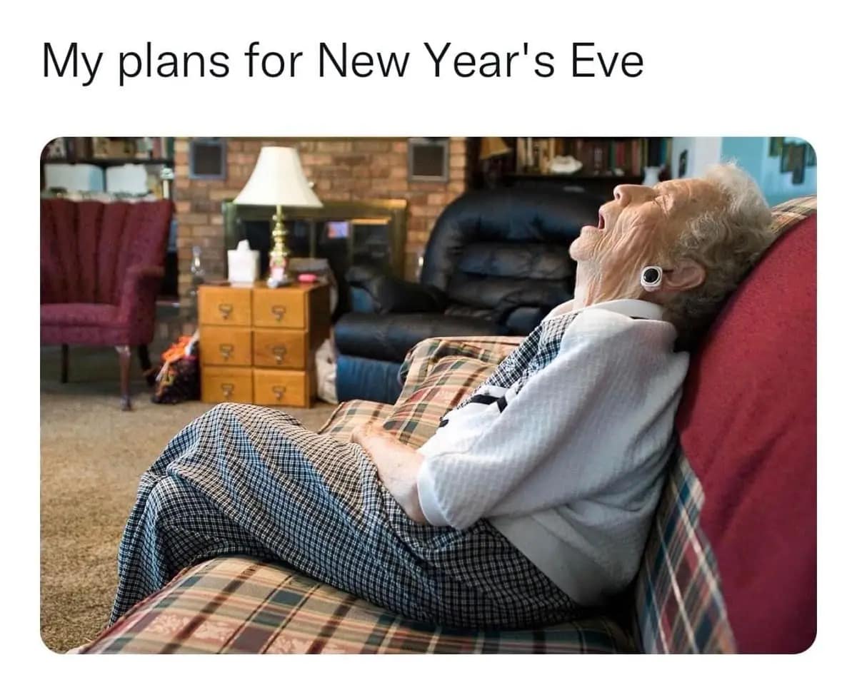 A funny photo of an elderly woman fast asleep on a couch captioned my plans for New Years Eve.