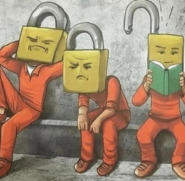 A thought provoking comic of a padlock unlocking itself by reading a book while others remain closed.