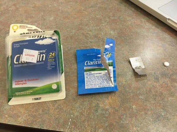 An unnecessary packaging photo of a large Claritin blister pack containing only one small pill
