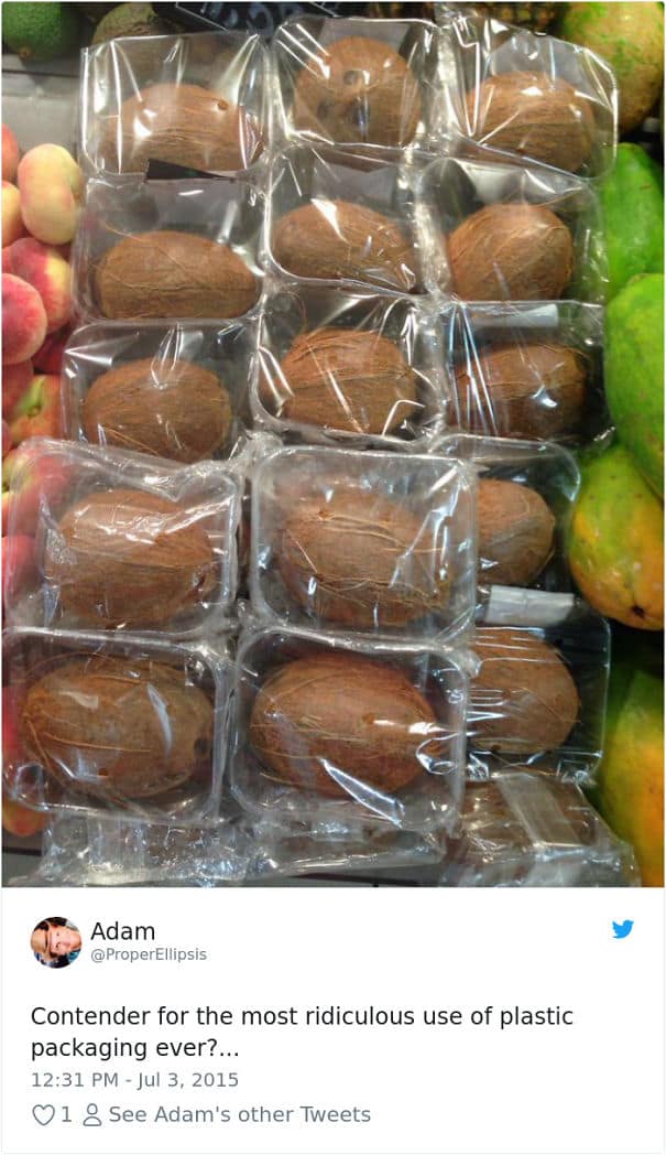 An unnecessary packaging fail of coconuts wrapped in plastic on trays.
