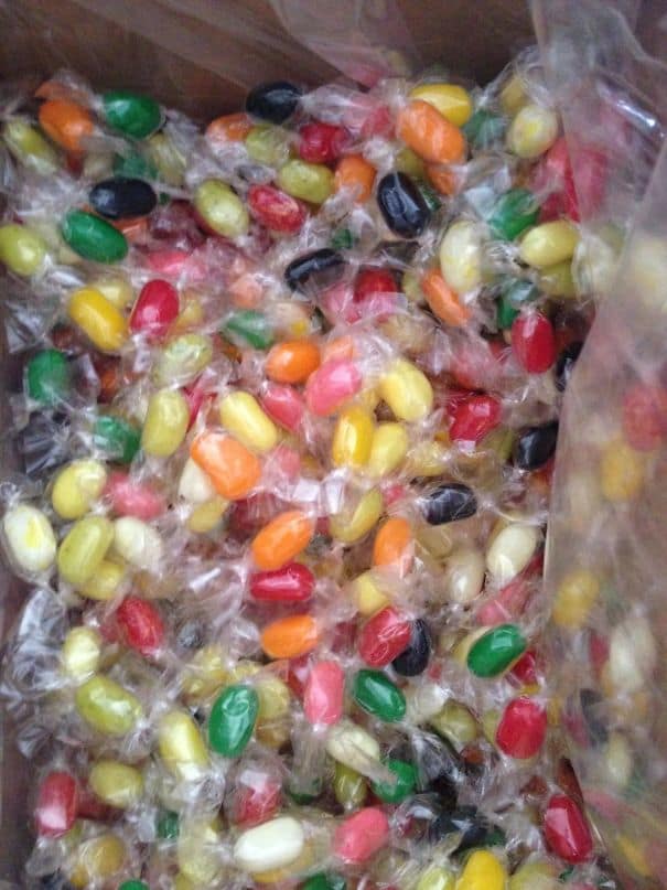 An unnecessary packaging photo of jelly beans individually wrapped in plastic.