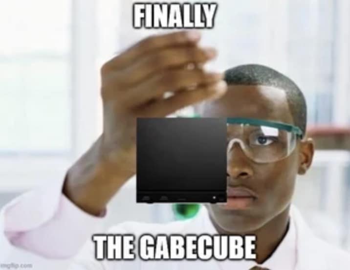 Scientist holding up a small black cube labeled "The Gabecube" in a Valve Steam Machine meme.