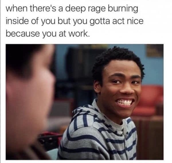Donald Glover forcing a painful smile in a work meme about suppressed rage.