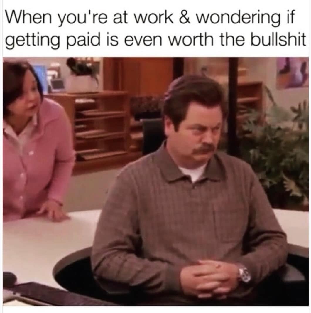 Ron Swanson staring blankly while ignoring a coworker in a work meme.