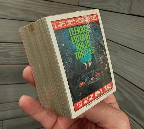 A sealed box of Topps Teenage Mutant Ninja Turtles Movie Cards, a collectible 90s toy.