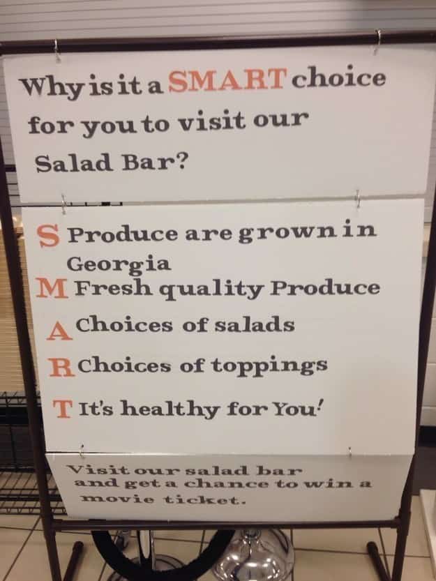 Salad bar sign using the acronym SMART where none of the letters match the words.