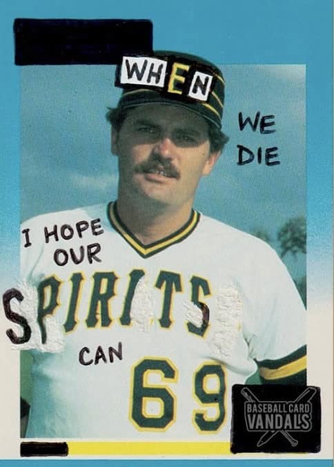 A creation by baseball card vandals featuring a mustachioed player with text about spirits wanting to "69" after death.