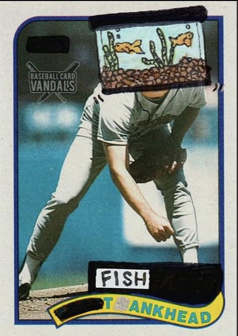 A baseball card vandals edit of a player named Tankhead showing a detailed fish tank drawn over his face.