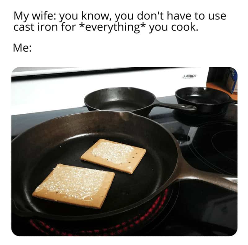 Two Pop Tarts frying in butter inside a large cast iron skillet.