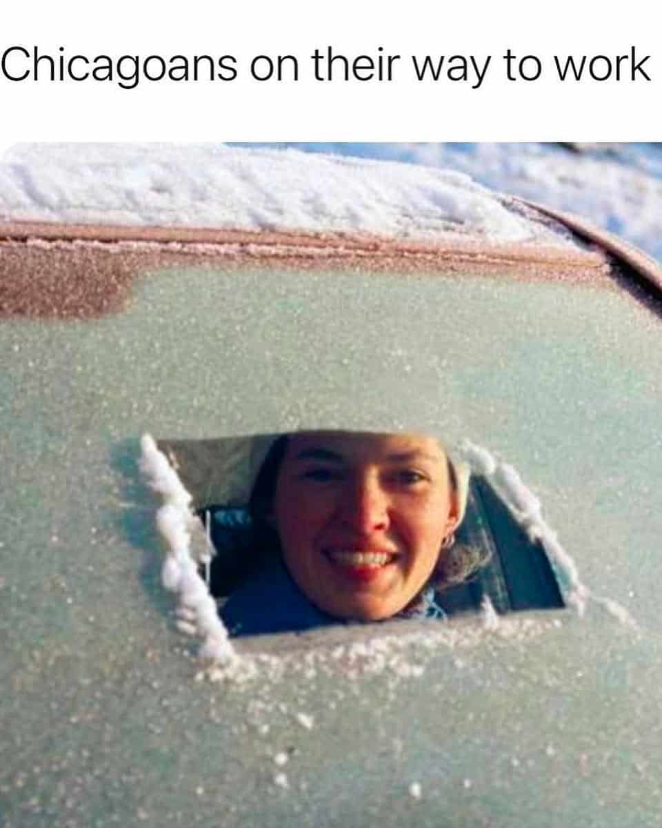 A Chicago meme showing a driver smiling through a tiny peephole in a frozen windshield.