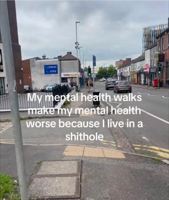 A classic meme showing a bleak, gray city street with text about "mental health walks" making things worse.