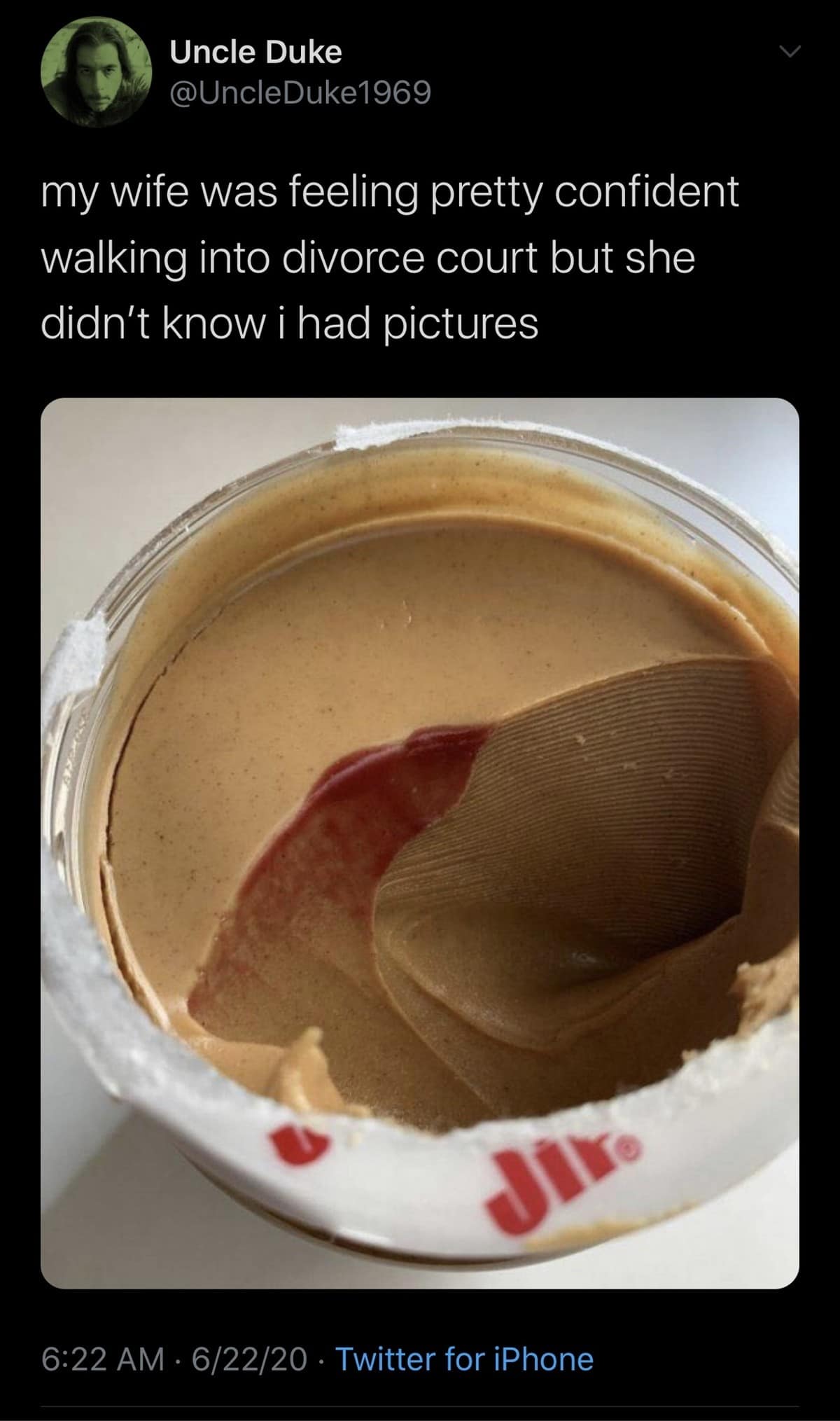 A viral tweet by Uncle Duke showing a jar of peanut butter with a perfect, clean scoop taken out, captioned about divorce court evidence.