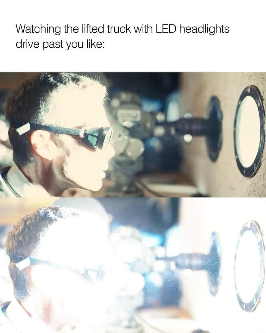 A classic meme of Cillian Murphy in Oppenheimer shielded from an intense white light, representing LED truck headlights.