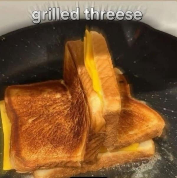 A classic meme showing three grilled cheese sandwiches stacked together, captioned "grilled threese."