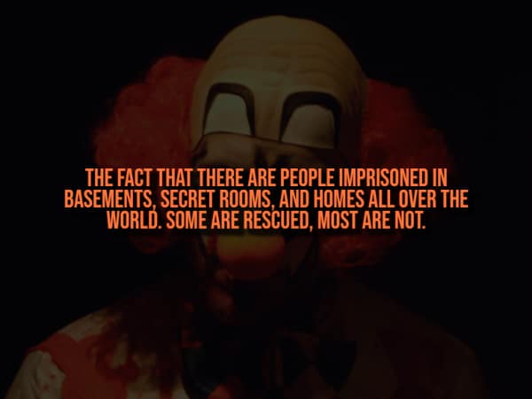 A scary clown face with text stating there are people imprisoned in basements all over the world right now.