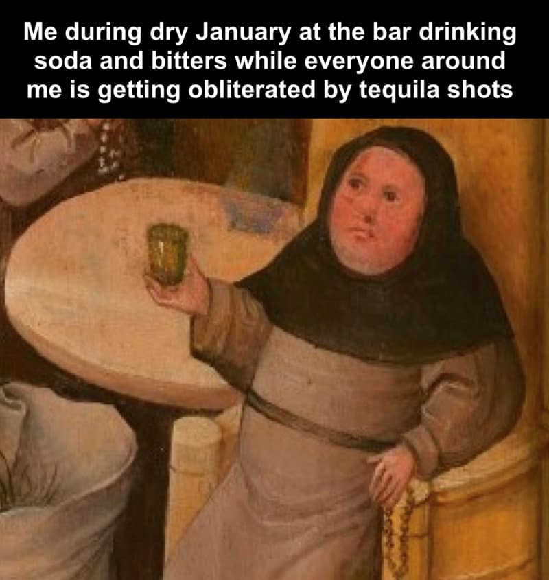 A medieval painting meme of a monk holding a small cup while others drink, representing doing Dry January at a bar.