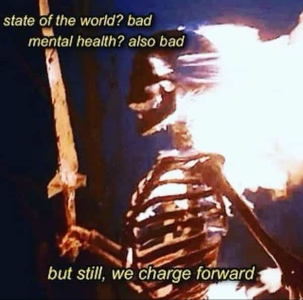 Flaming skeleton warrior with a sword charging forward despite bad mental health text overlay.