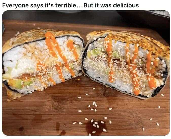 Cross section of a deep fried sushi crunchwrap filled with rice.