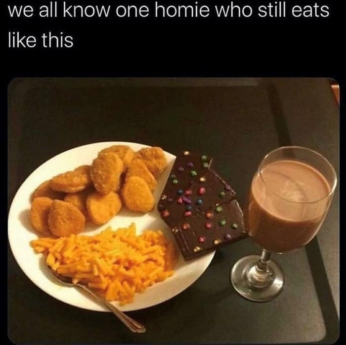 A food meme showing a plate of chicken nuggets, mac and cheese, and a cosmic brownie with a glass of chocolate milk.