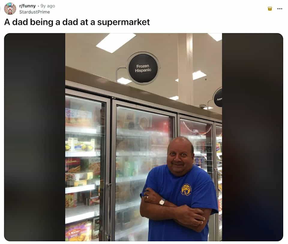 Hispanic dad smiling proudly under a supermarket sign reading Frozen Hispanic.