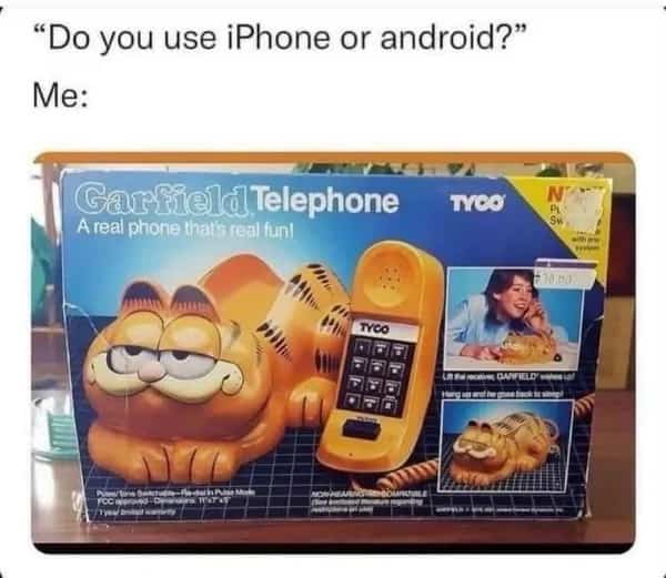 Box for a vintage Garfield telephone compared to iPhone or Android.