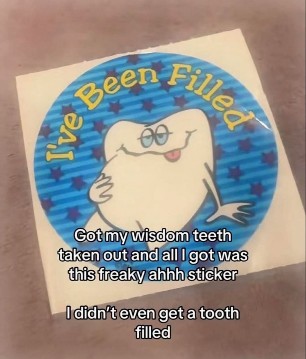 Photo of a suggestive dental sticker saying "I've Been Filled" given after surgery.