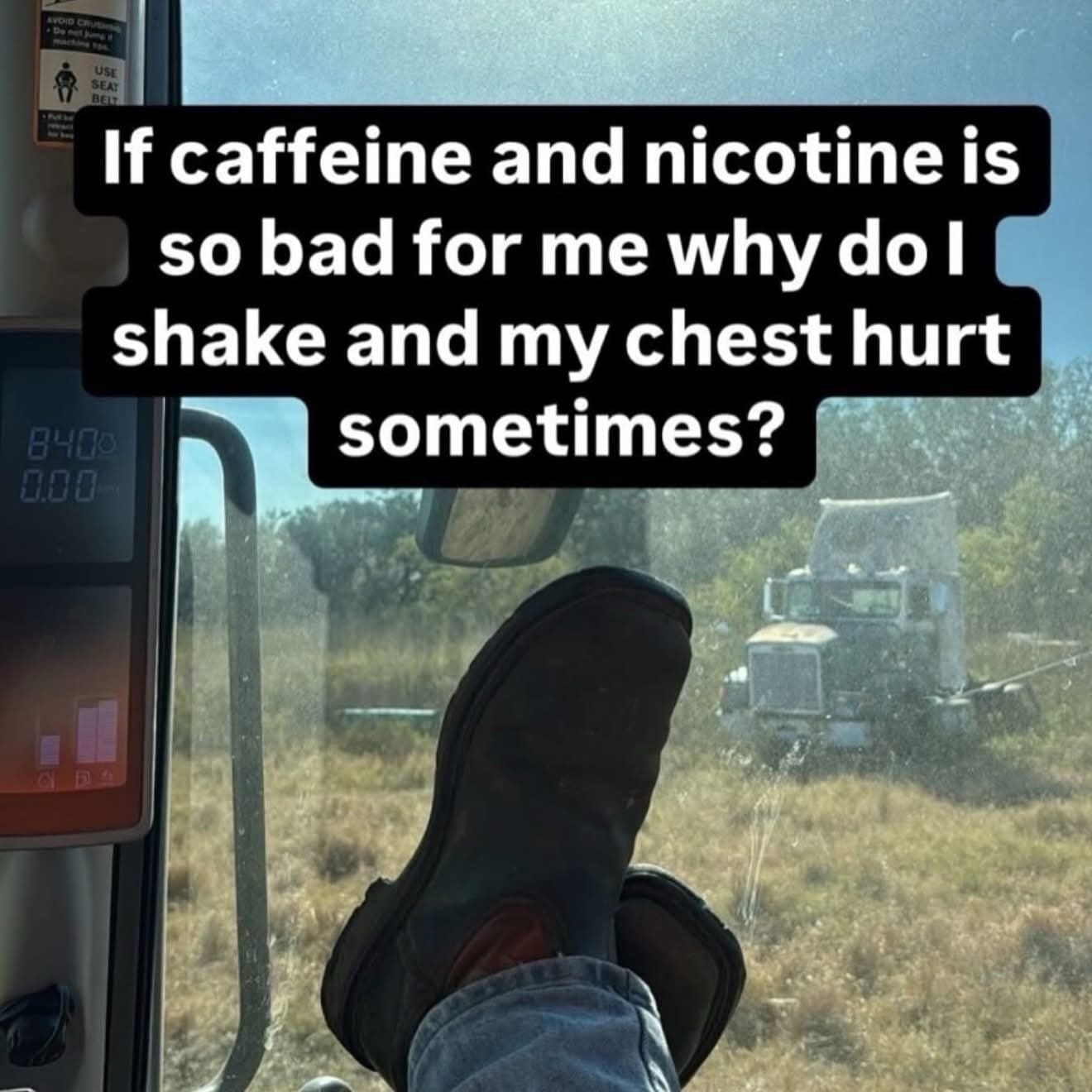 View from inside a tractor cab with text joking about chest pain from caffeine and nicotine.