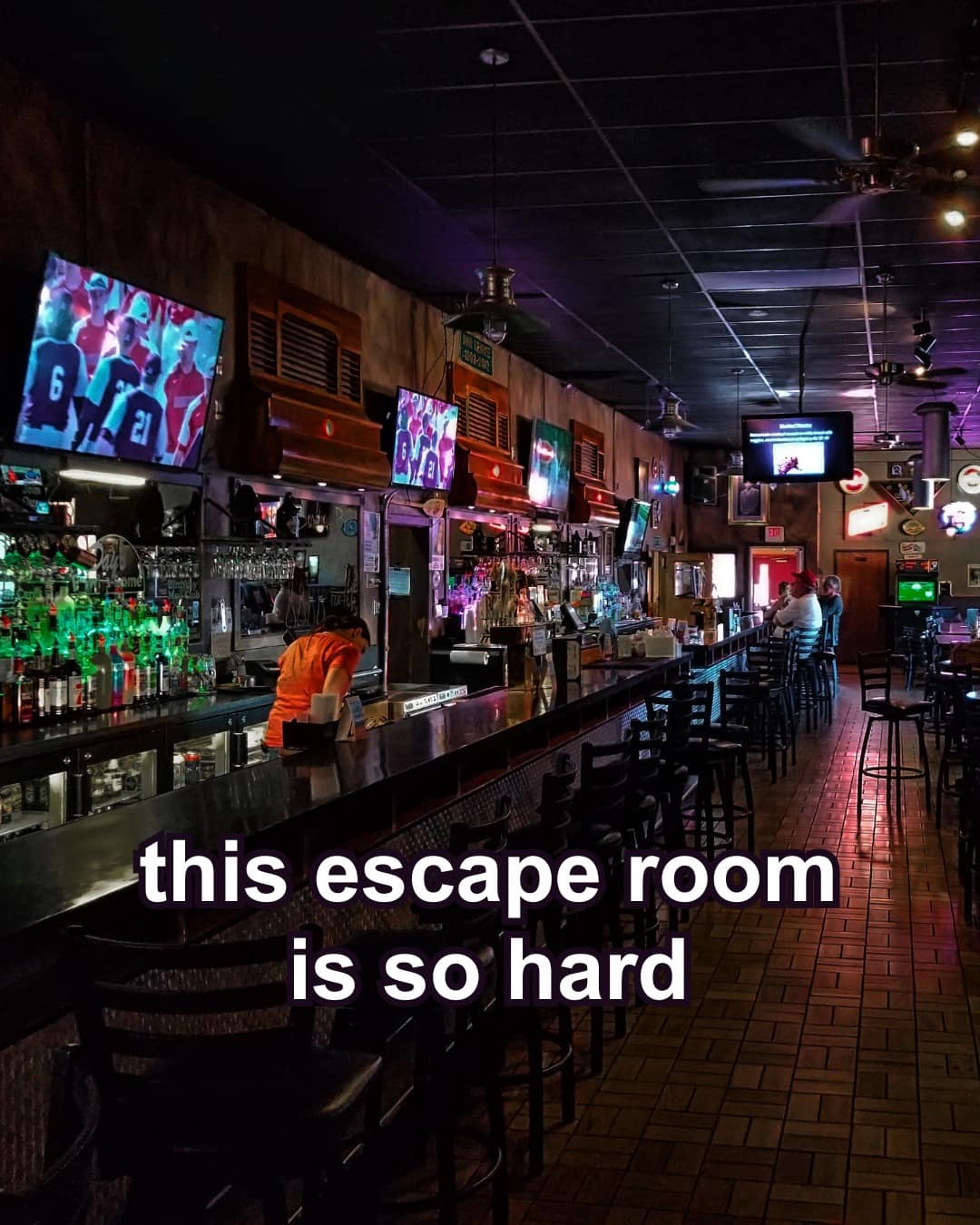 Photo of a regular bar interior captioned this escape room is so hard.