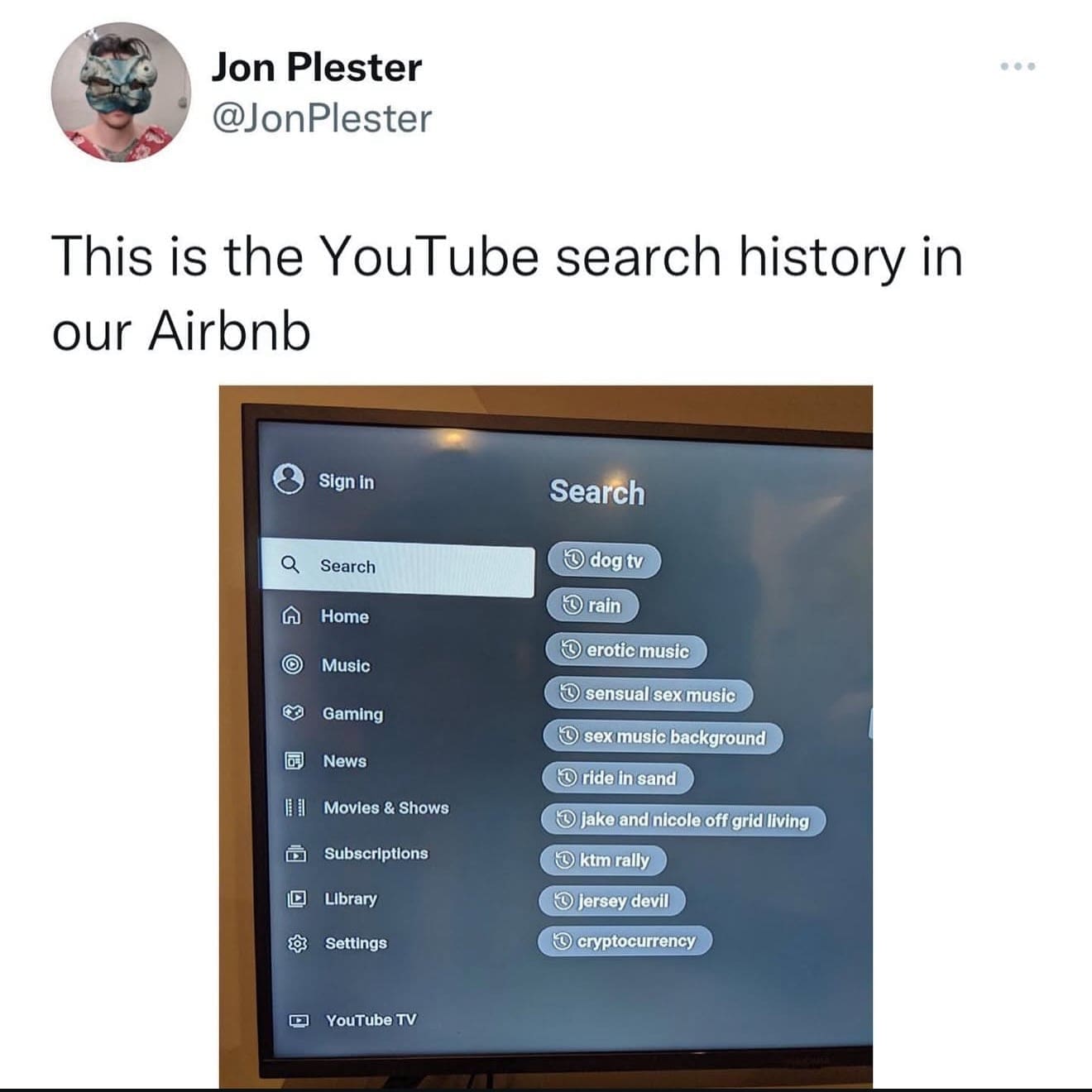 TV screen showing a bizarre mix of YouTube search history from an Airbnb guest.