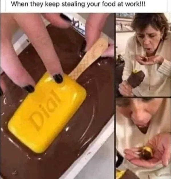 Young boy sleeping on airport carpet with a charging cable dangling onto his face.